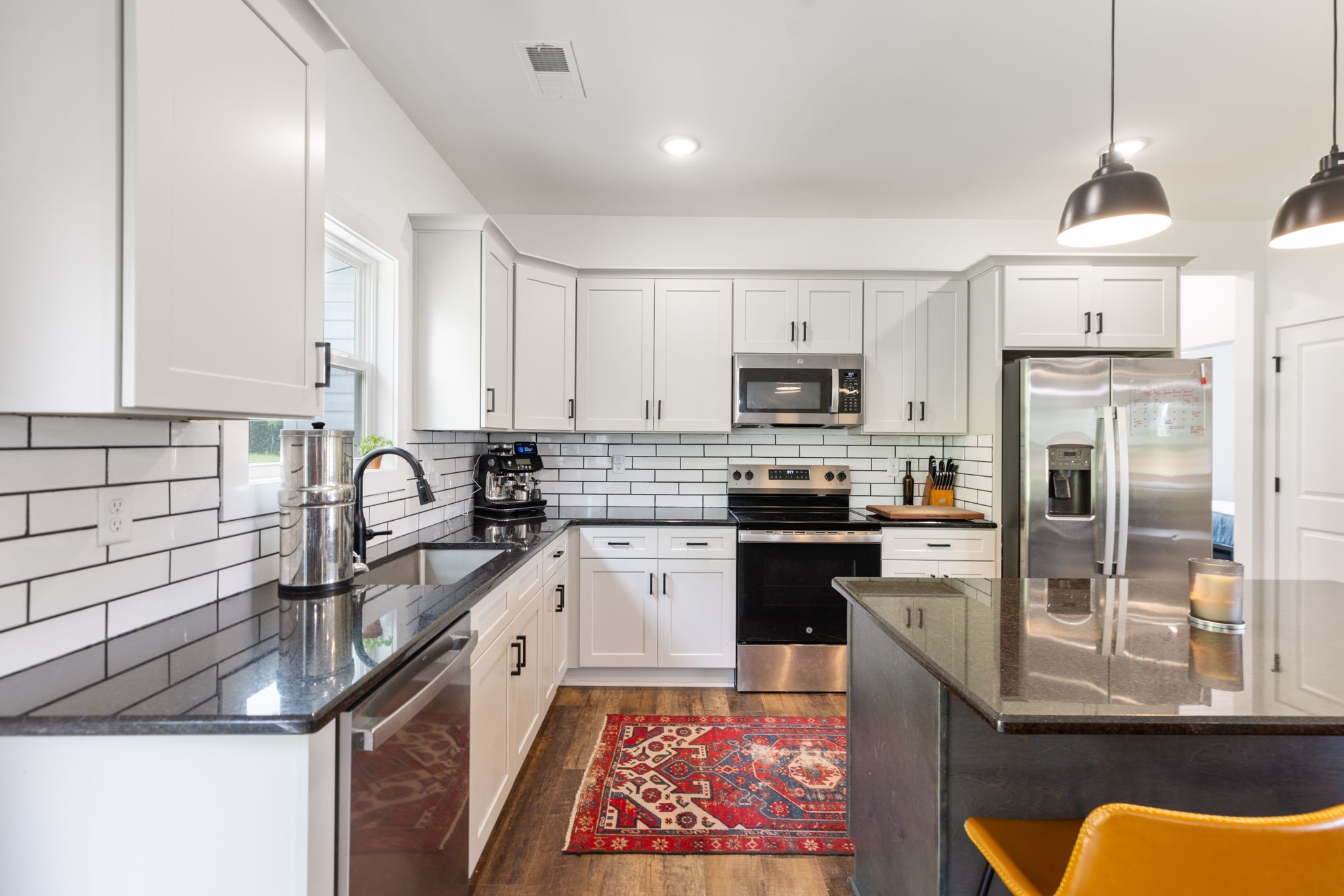 1578 Angus Way Greenbrier, TN 37073 - Photo 20 of 45 a kitchen with granite countertop stainless steel appliances a sink a counter top space cabinets and stainless steel appliances