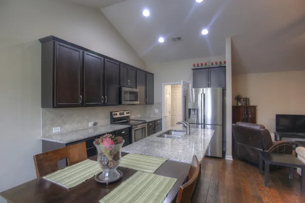 a utility room with a sink a washer and dryer