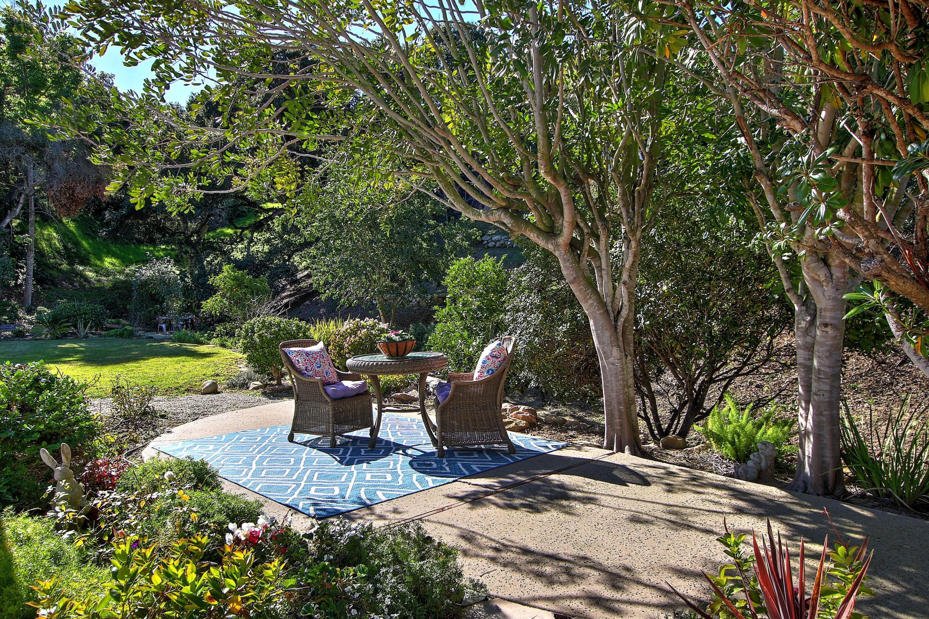 1102 Plaza Del Monte Santa Barbara, CA 93101 - Photo 31 of 53 a view of a swimming pool with a lounge chair and garden