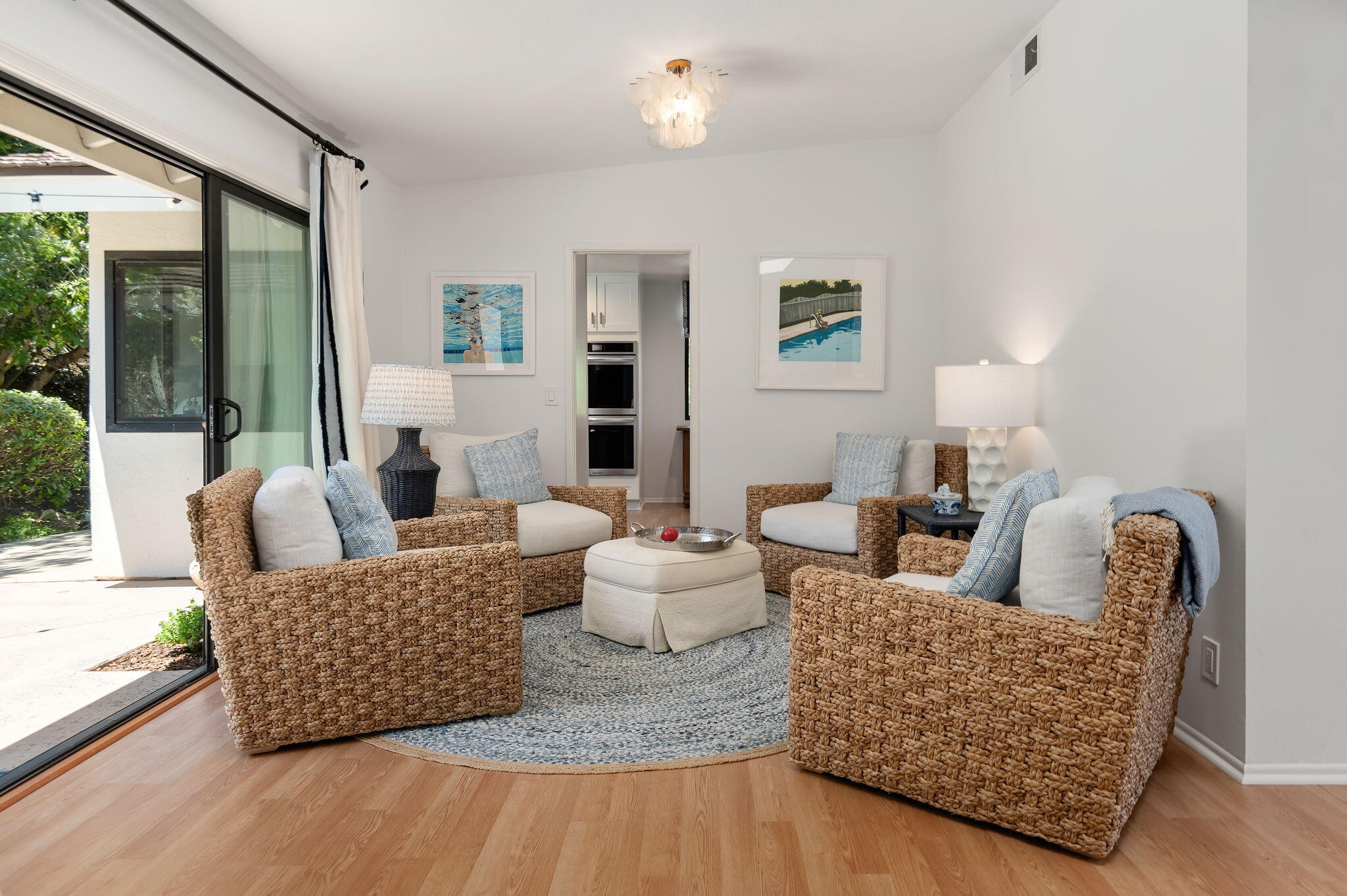 1102 Plaza Del Monte Santa Barbara, CA 93101 - Photo 36 of 53 a living room with furniture and wooden floor