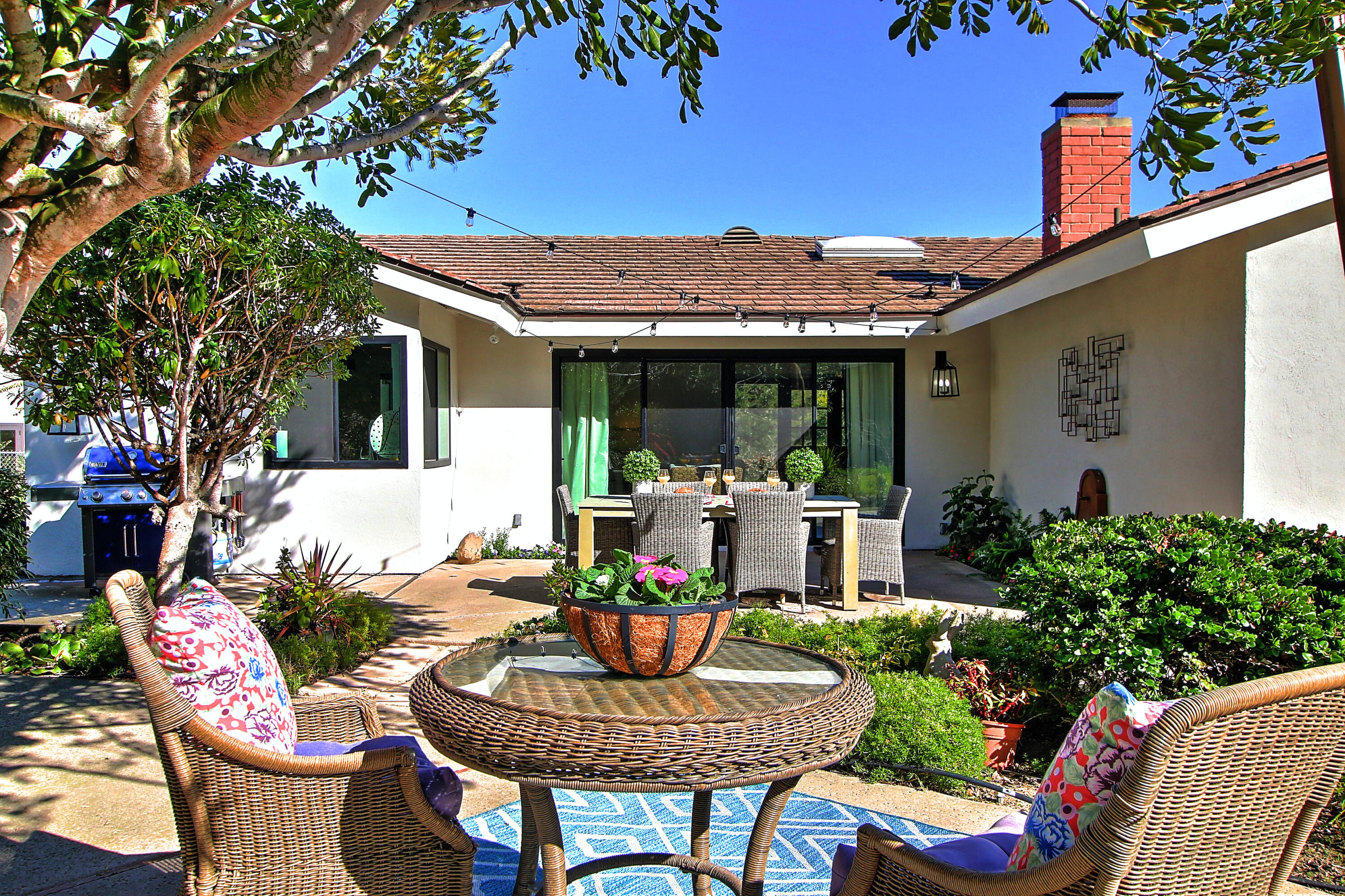 1102 Plaza Del Monte Santa Barbara, CA 93101 - Photo 9 of 53 a view of a patio with couches table and chairs and potted plants