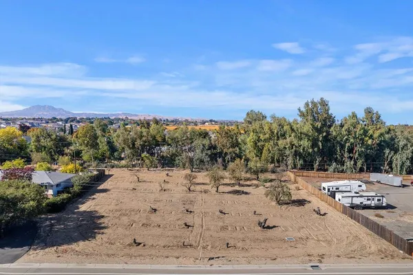 a view of a backyard of a house