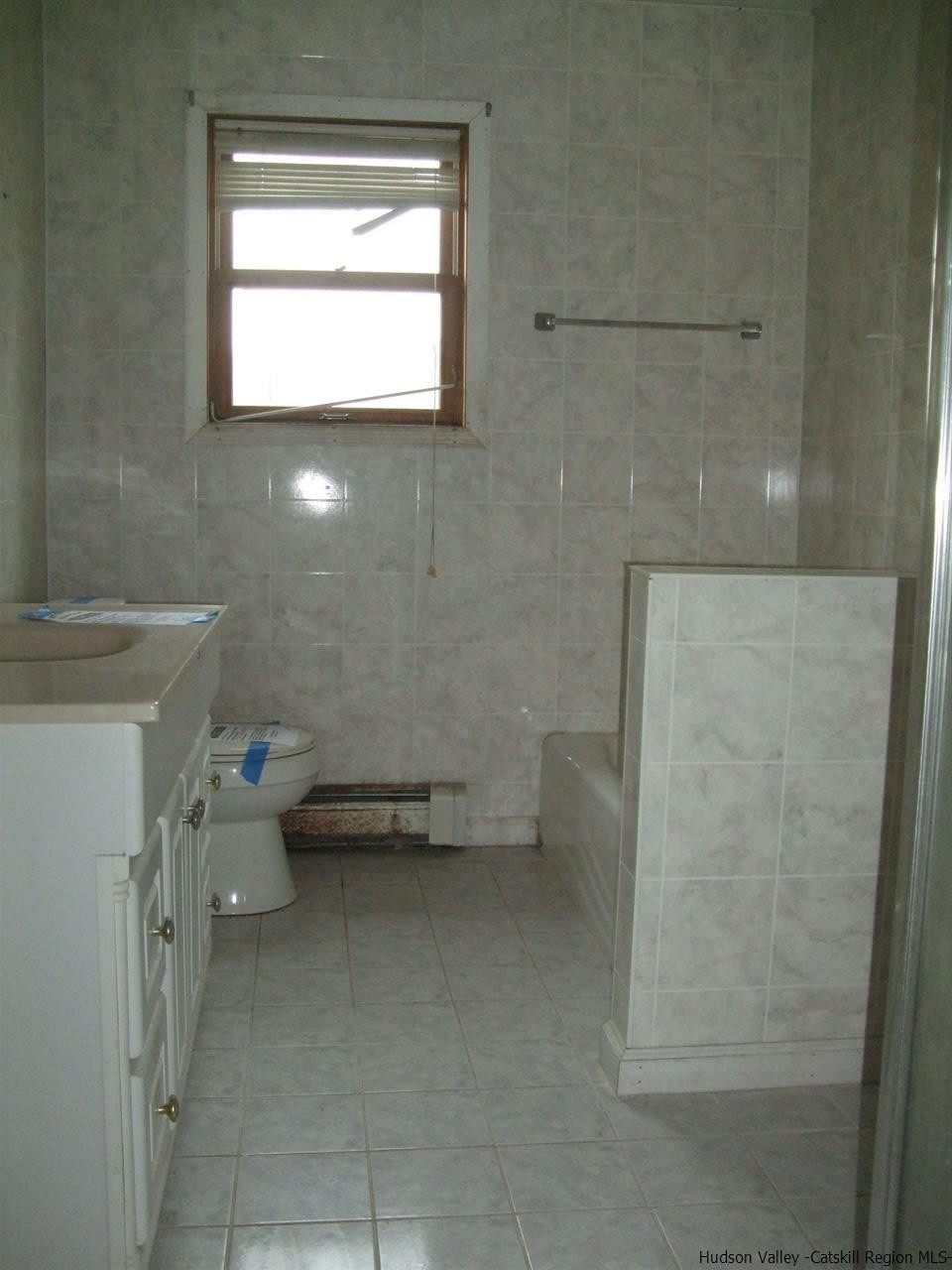 63 Hommelville Road Saugerties, NY 12477 - Photo 5 of 9 a bathroom with a toilet