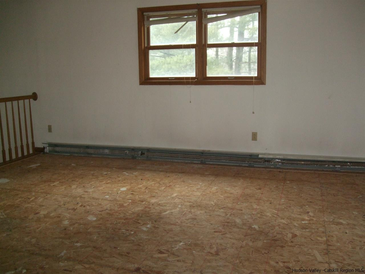 63 Hommelville Road Saugerties, NY 12477 - Photo 7 of 9 an empty room with a window