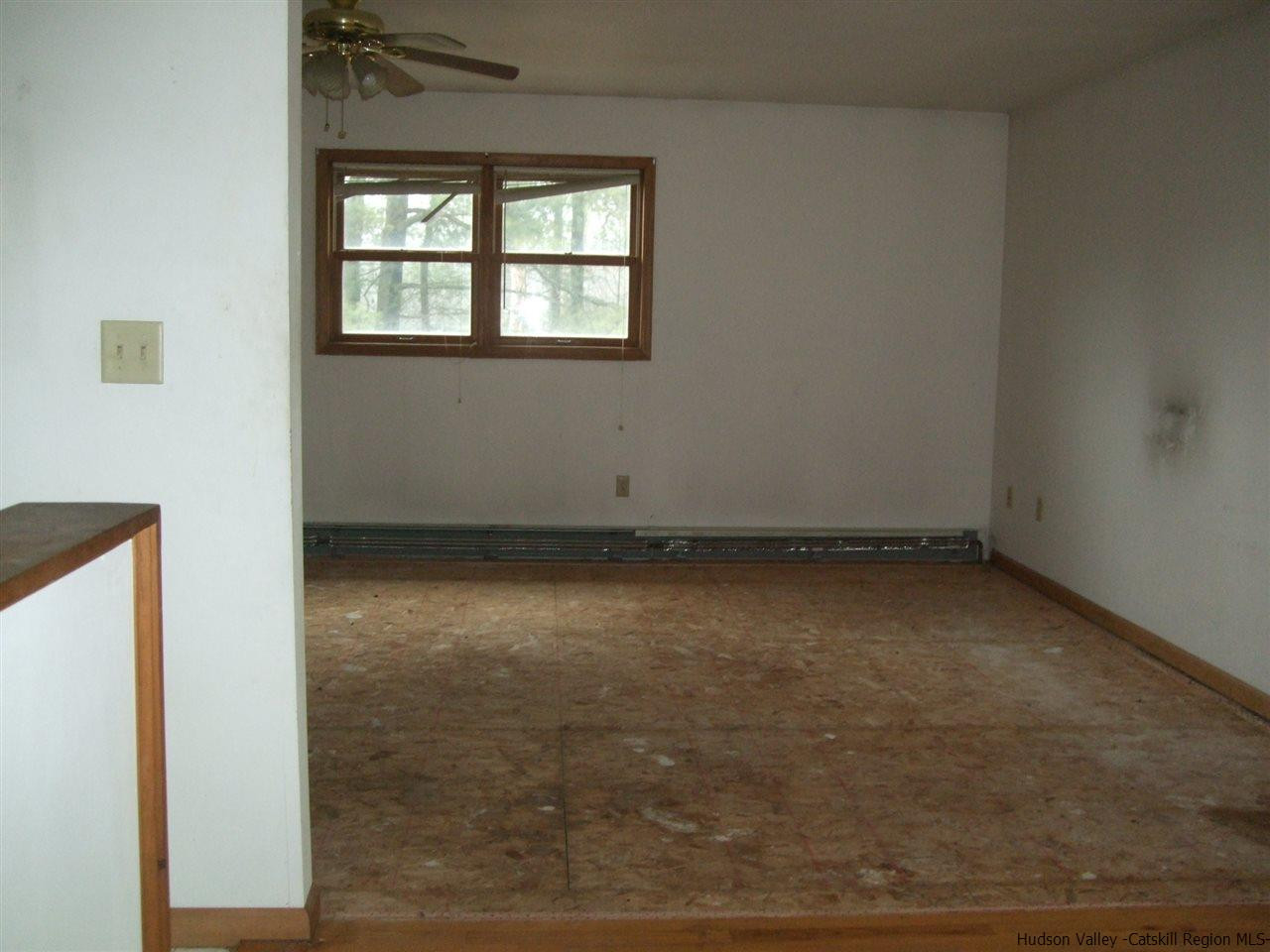 63 Hommelville Road Saugerties, NY 12477 - Photo 9 of 9 an empty room with a window