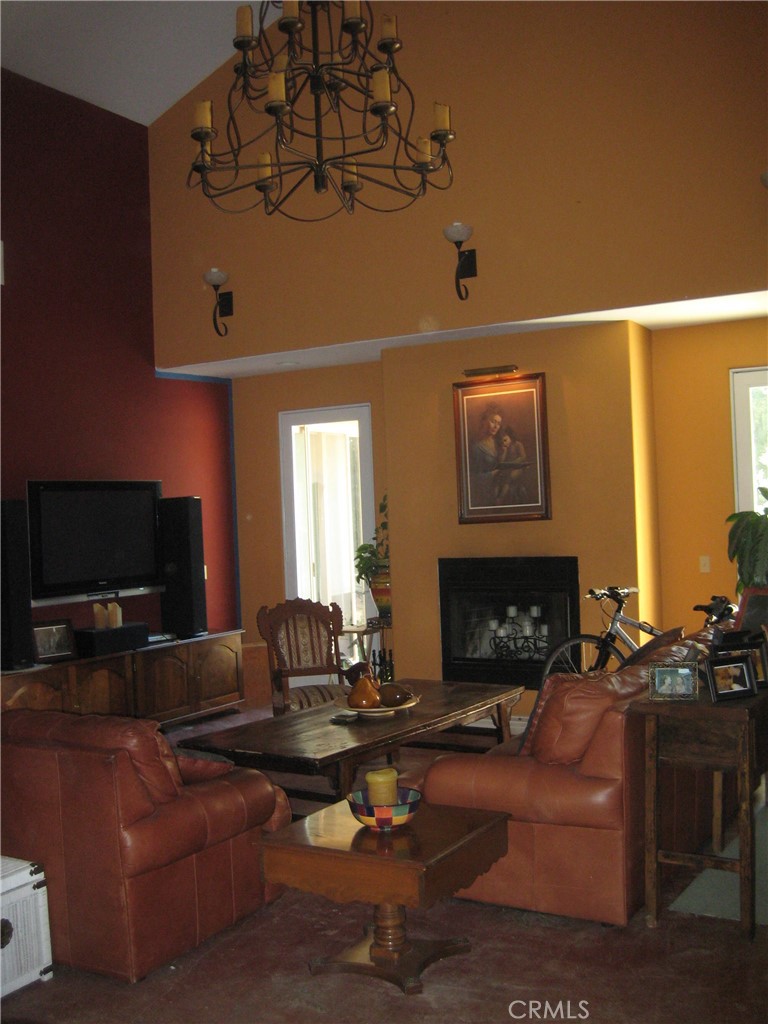 12241 Broadway Road Moorpark, CA 93021 - Photo 3 of 10 a living room with furniture and a fireplace