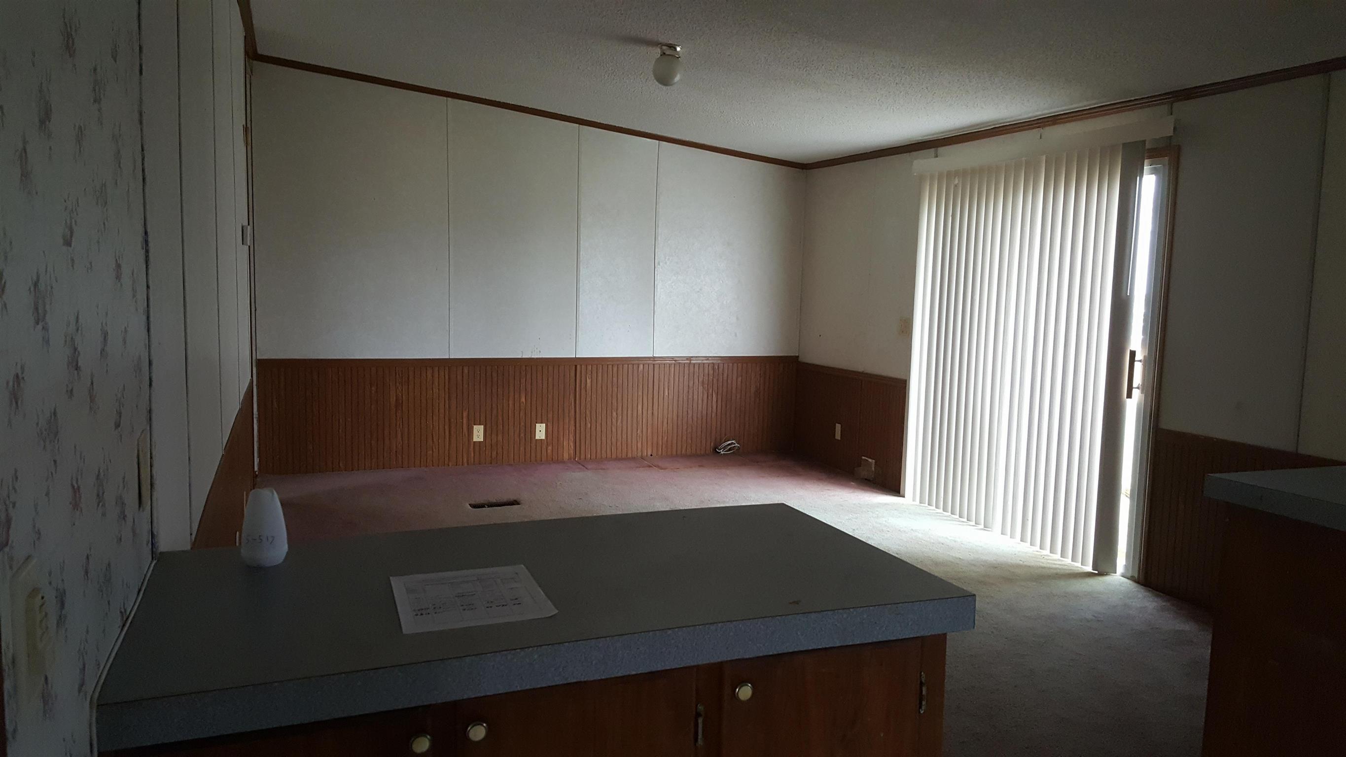 10 Zinker Road Lawrenceburg, TN 38464 - Photo 4 of 11 a view of an empty room with a window