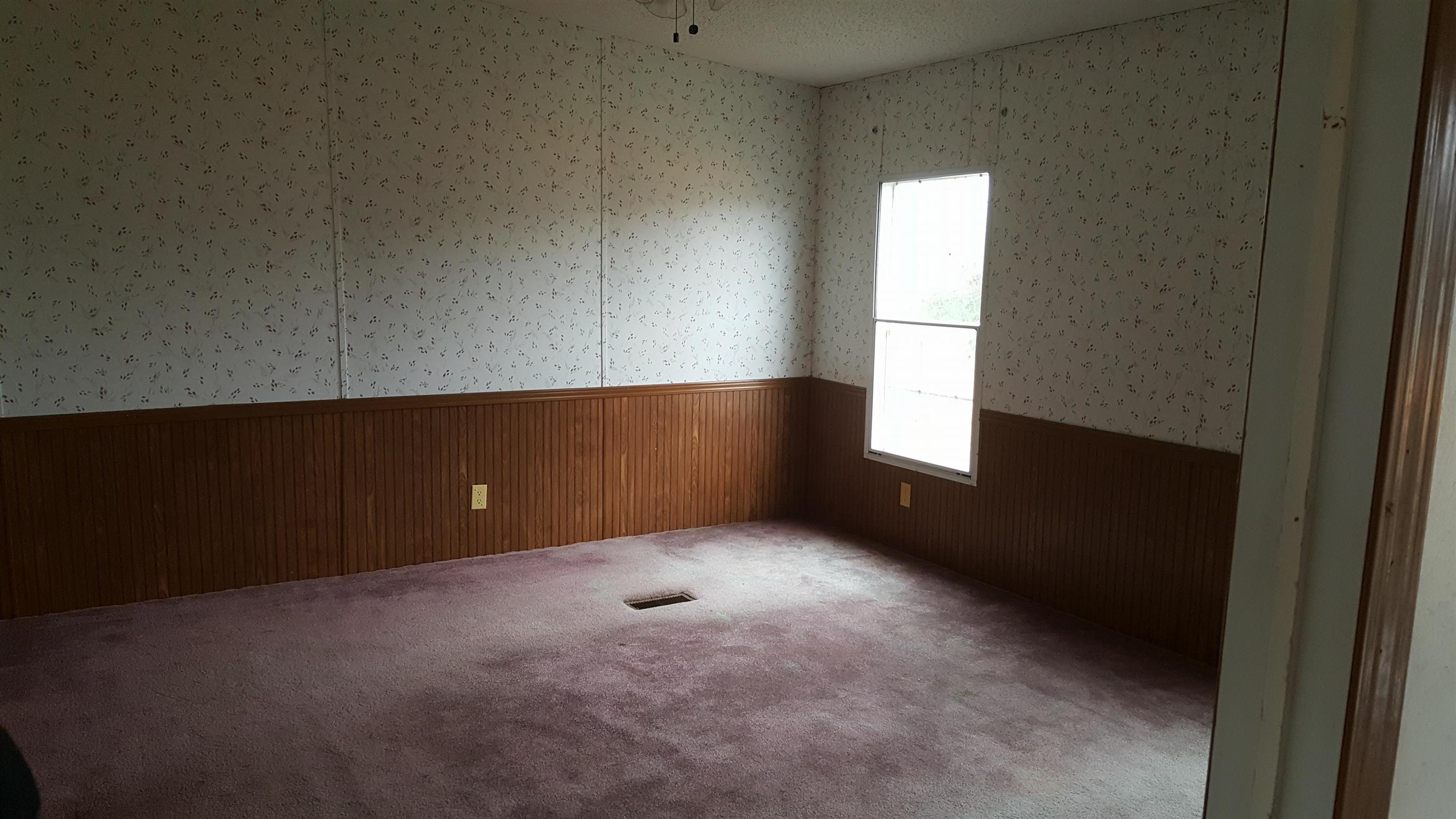 10 Zinker Road Lawrenceburg, TN 38464 - Photo 7 of 11 an empty room with windows