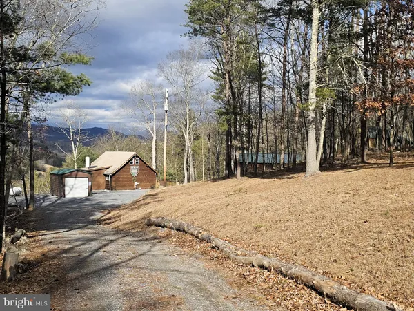 a view of large space with a house