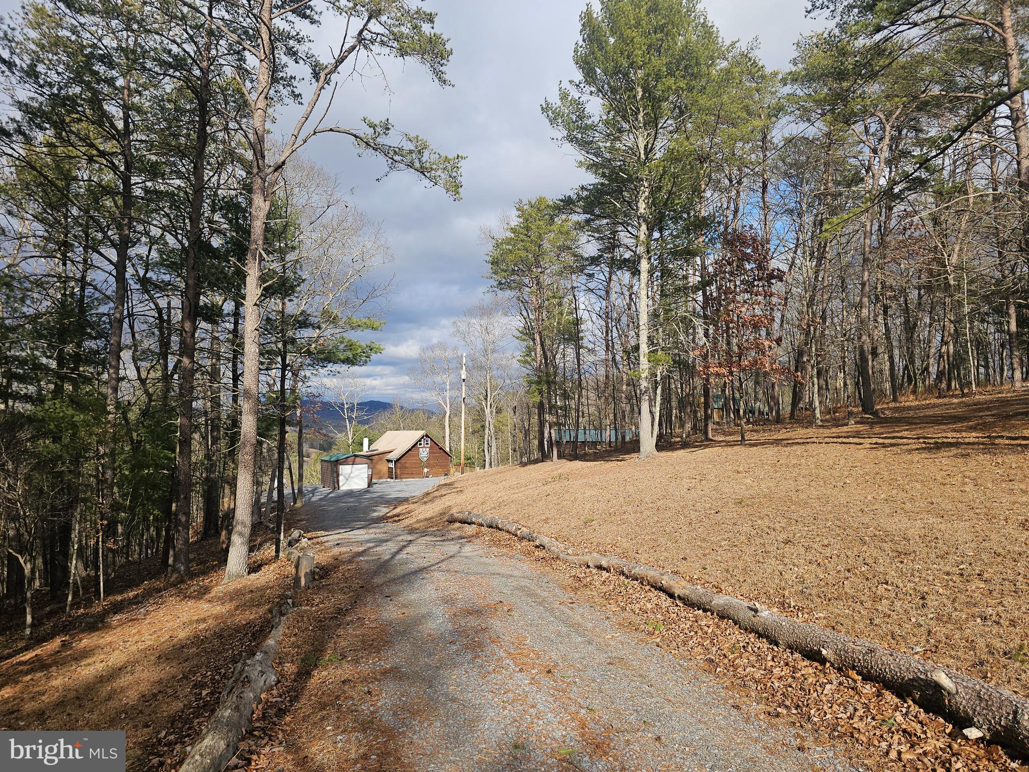 211 Martin Road Artemas, PA 17211 - Photo 19 of 38 a view of a backyard of the house