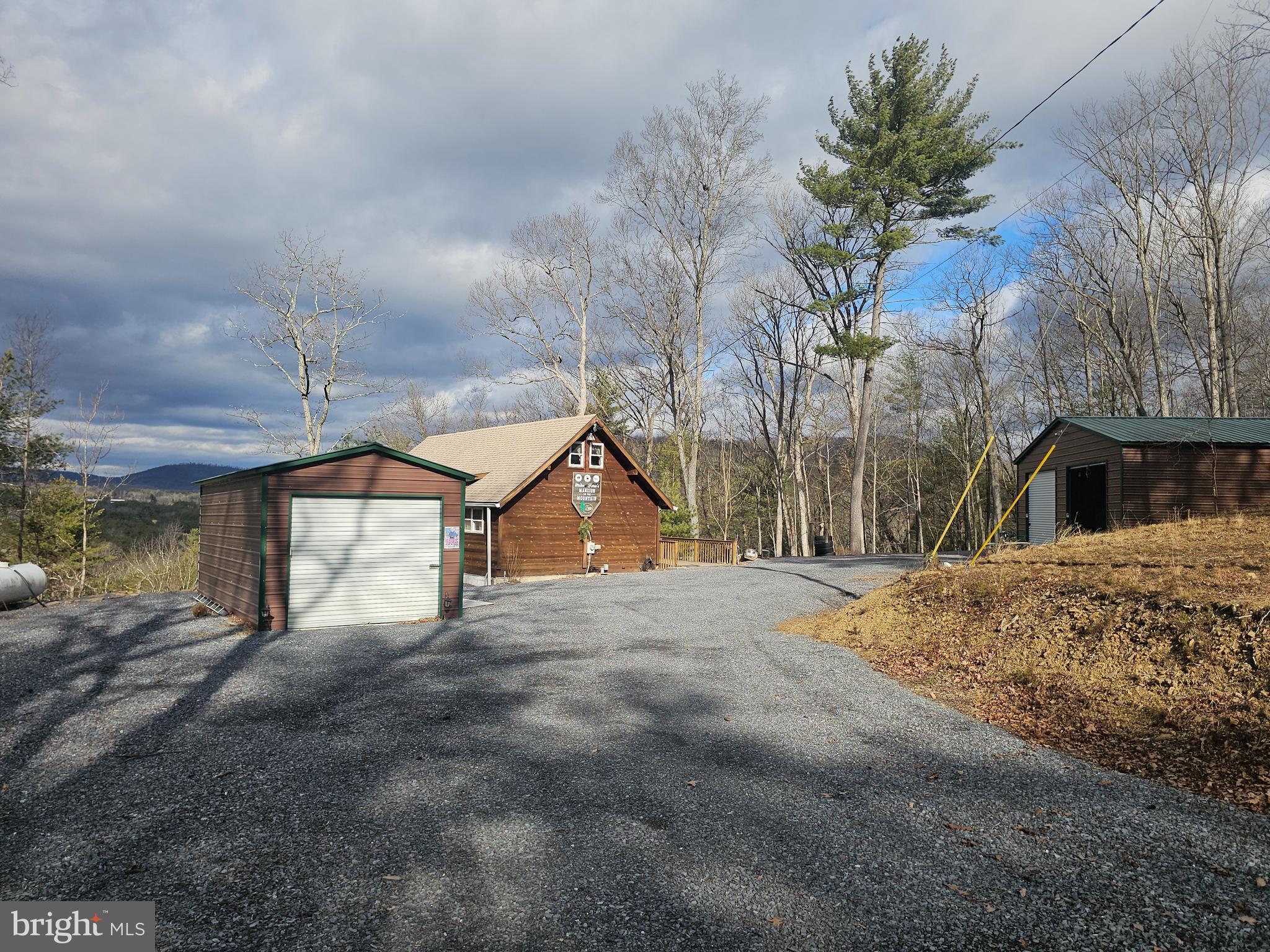 211 Martin Road Artemas, PA 17211 - Photo 21 of 38 a view of a house with a snow in the yard