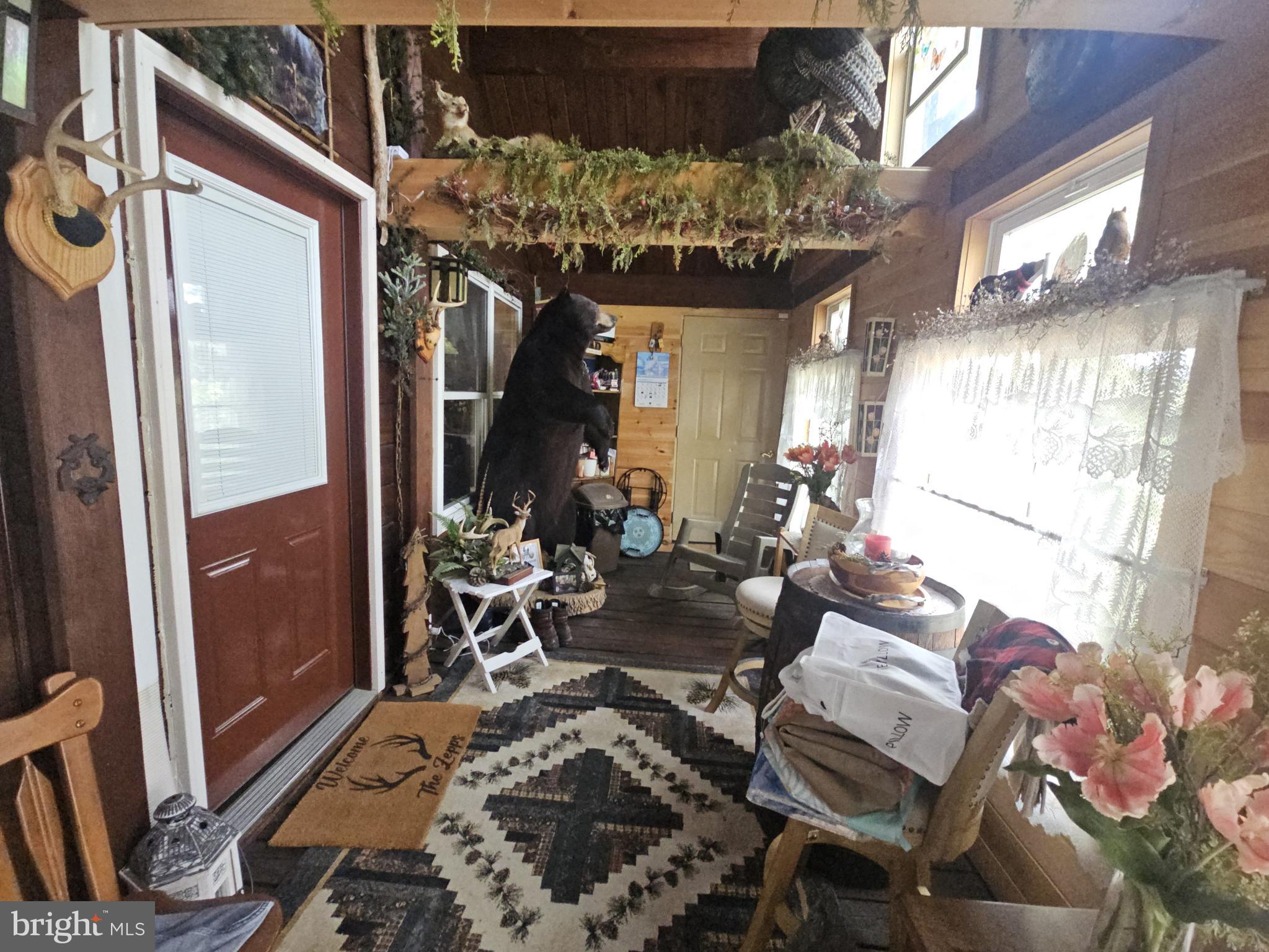 211 Martin Road Artemas, PA 17211 - Photo 32 of 38 a view of a dining room with furniture window and outside view