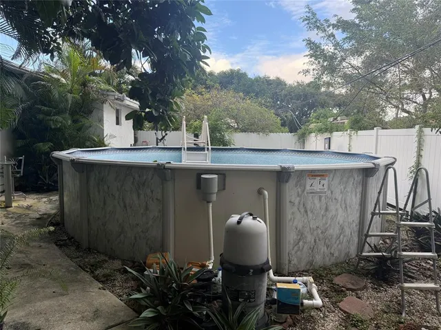 a view of a patio in backyard