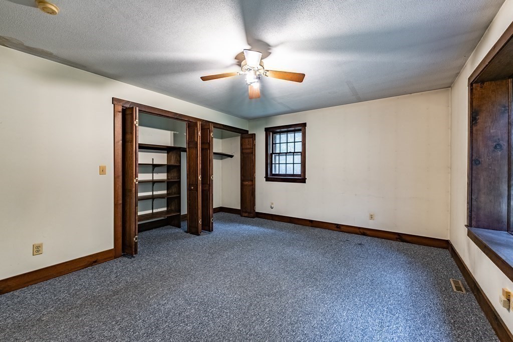 22 Upper Pomeroy Road Montgomery, MA 01085 - Photo 9 of 23 a view of an empty room with a window