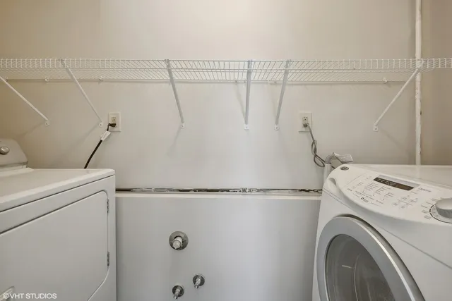 a utility room with dryer and washer