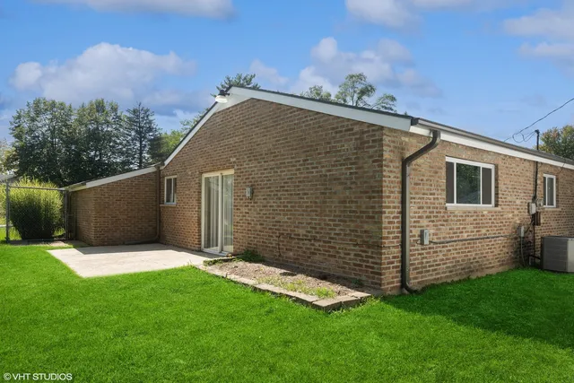 a backyard of a house with lots of green space