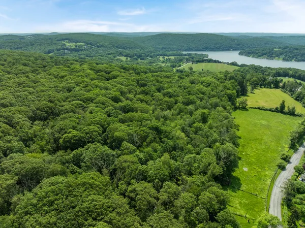 a view of a green field with lots of green space