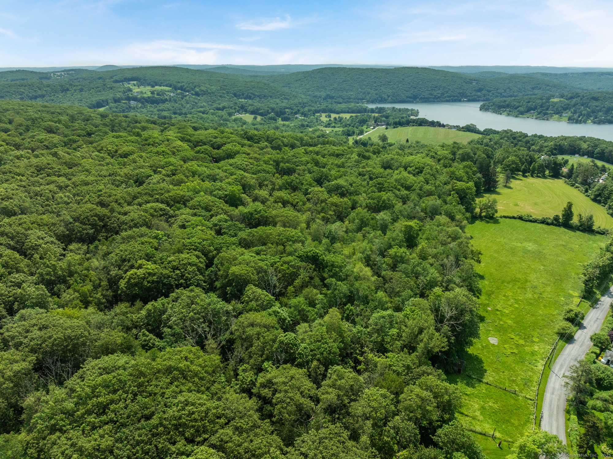 Curtiss Road Warren, CT 06777 - Photo 4 of 13 a view of a green field with lots of green space