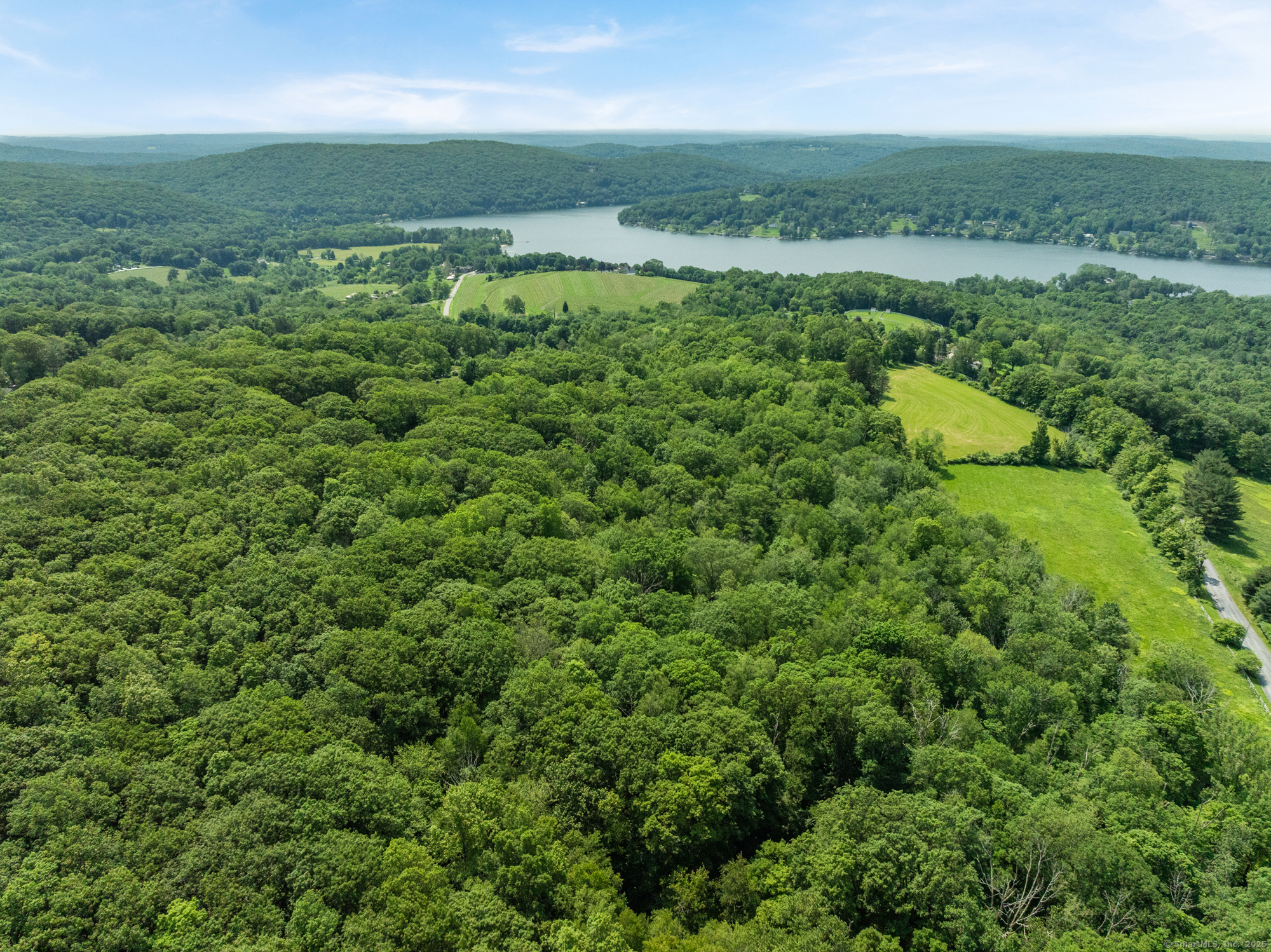 Curtiss Road Warren, CT 06777 - Photo 6 of 13 a view of a lake with a city