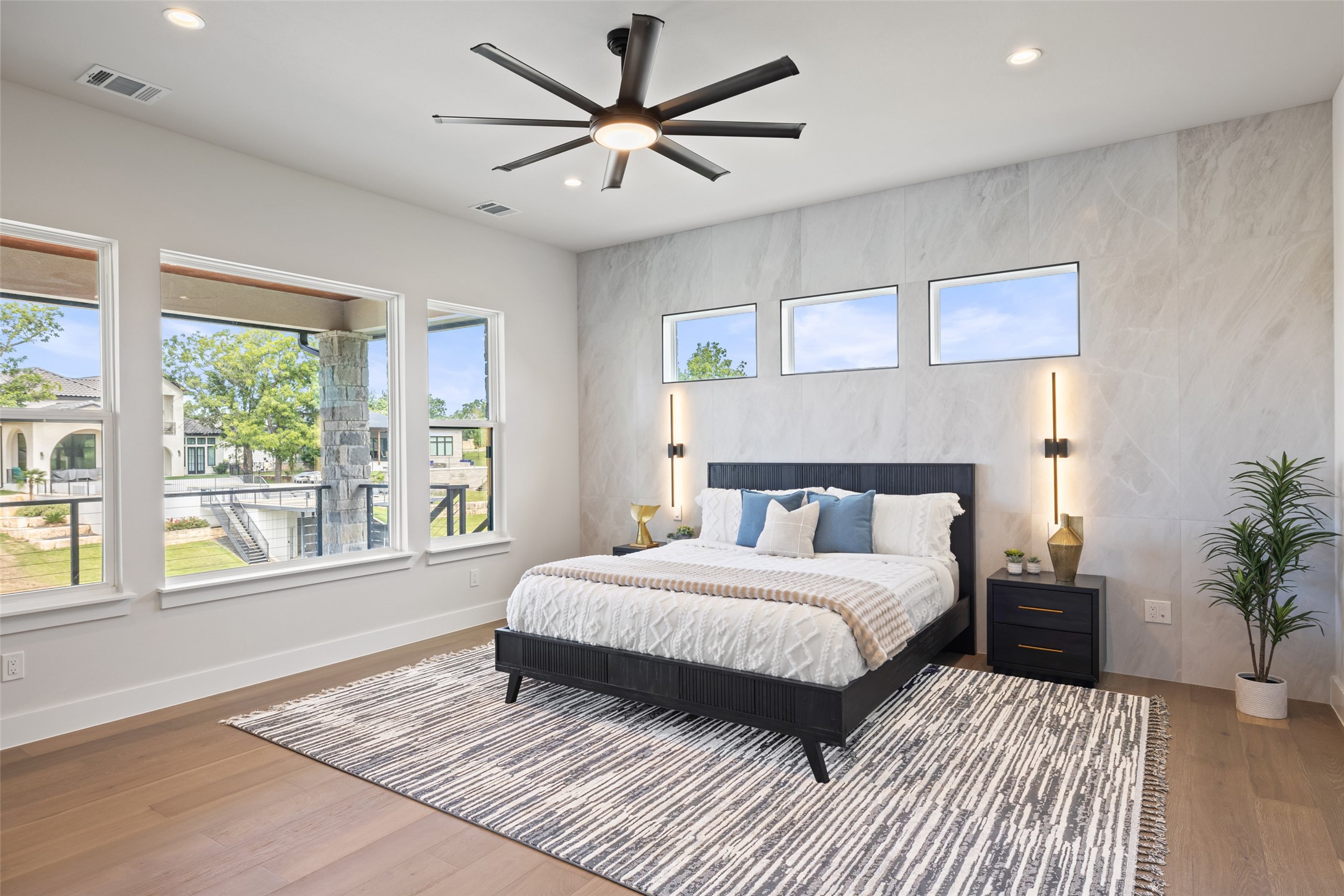 117 Hannahs Way Burnet, TX 78611 - Photo 24 of 28 a bedroom with a large bed and a large window