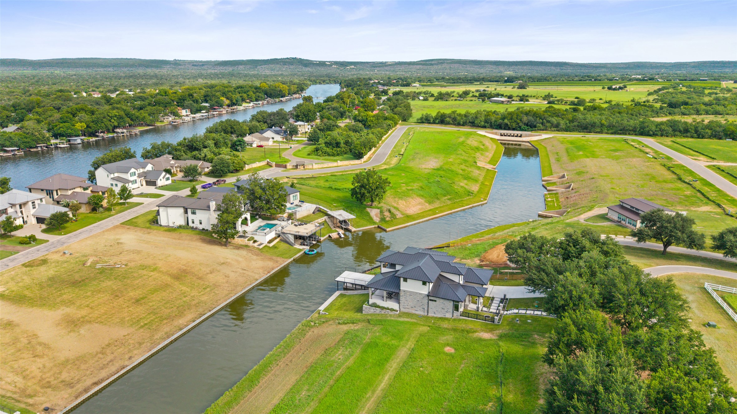 117 Hannahs Way Burnet, TX 78611 - Photo 27 of 28 an aerial view of residential houses with outdoor space and lake view