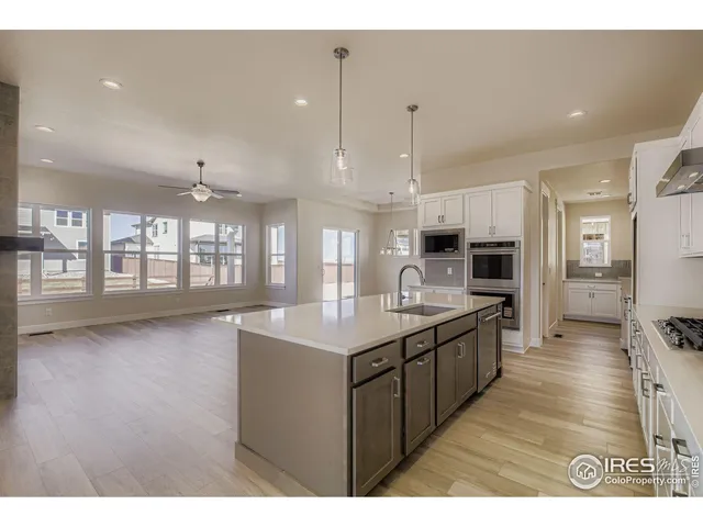 $925,000 | 1648 Sundown Run Drive, Windsor, CO 80550