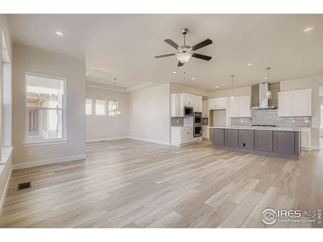 $925,000 | 1648 Sundown Run Drive, Windsor, CO 80550