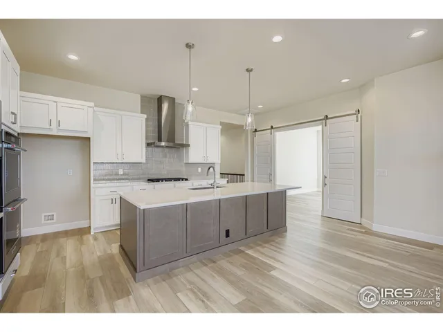 $925,000 | 1648 Sundown Run Drive, Windsor, CO 80550