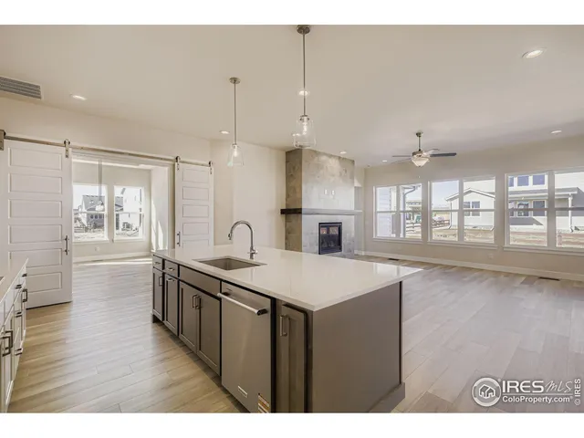 $925,000 | 1648 Sundown Run Drive, Windsor, CO 80550