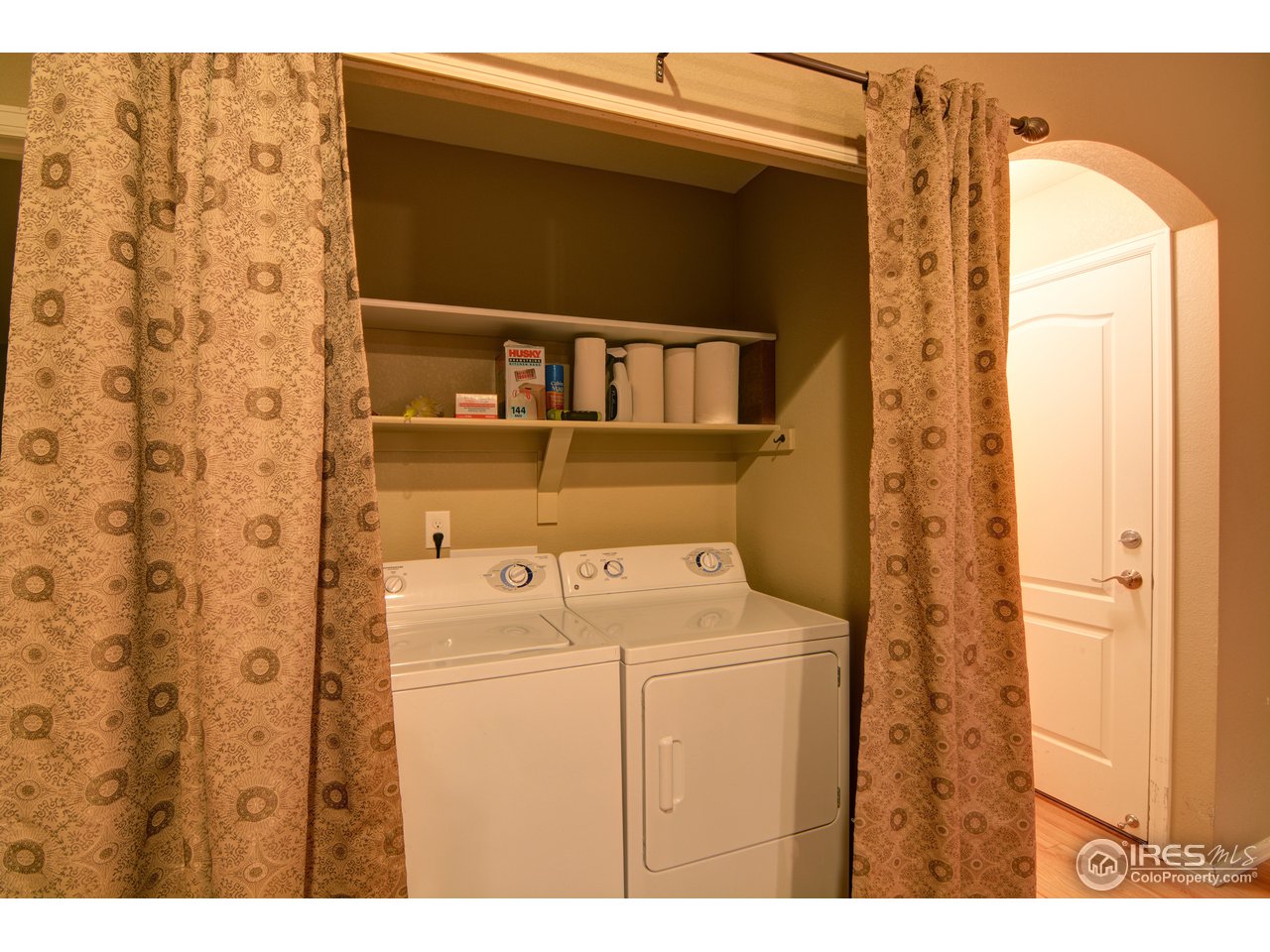 8050 Raspberry Drive Frederick, CO 80504 - Photo 15 of 17 a utility room with dryer and washer