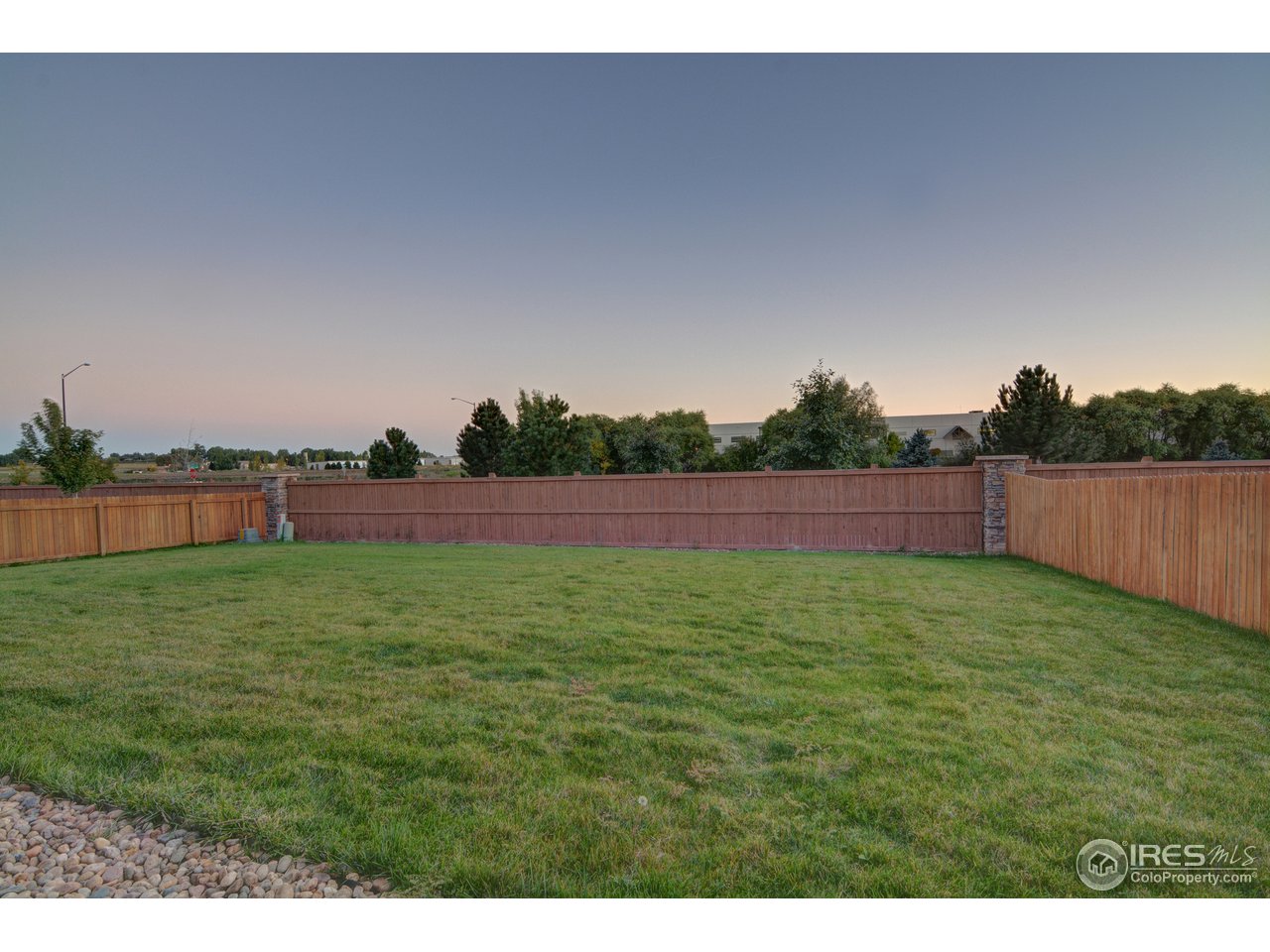 8050 Raspberry Drive Frederick, CO 80504 - Photo 7 of 17 a view of a yard