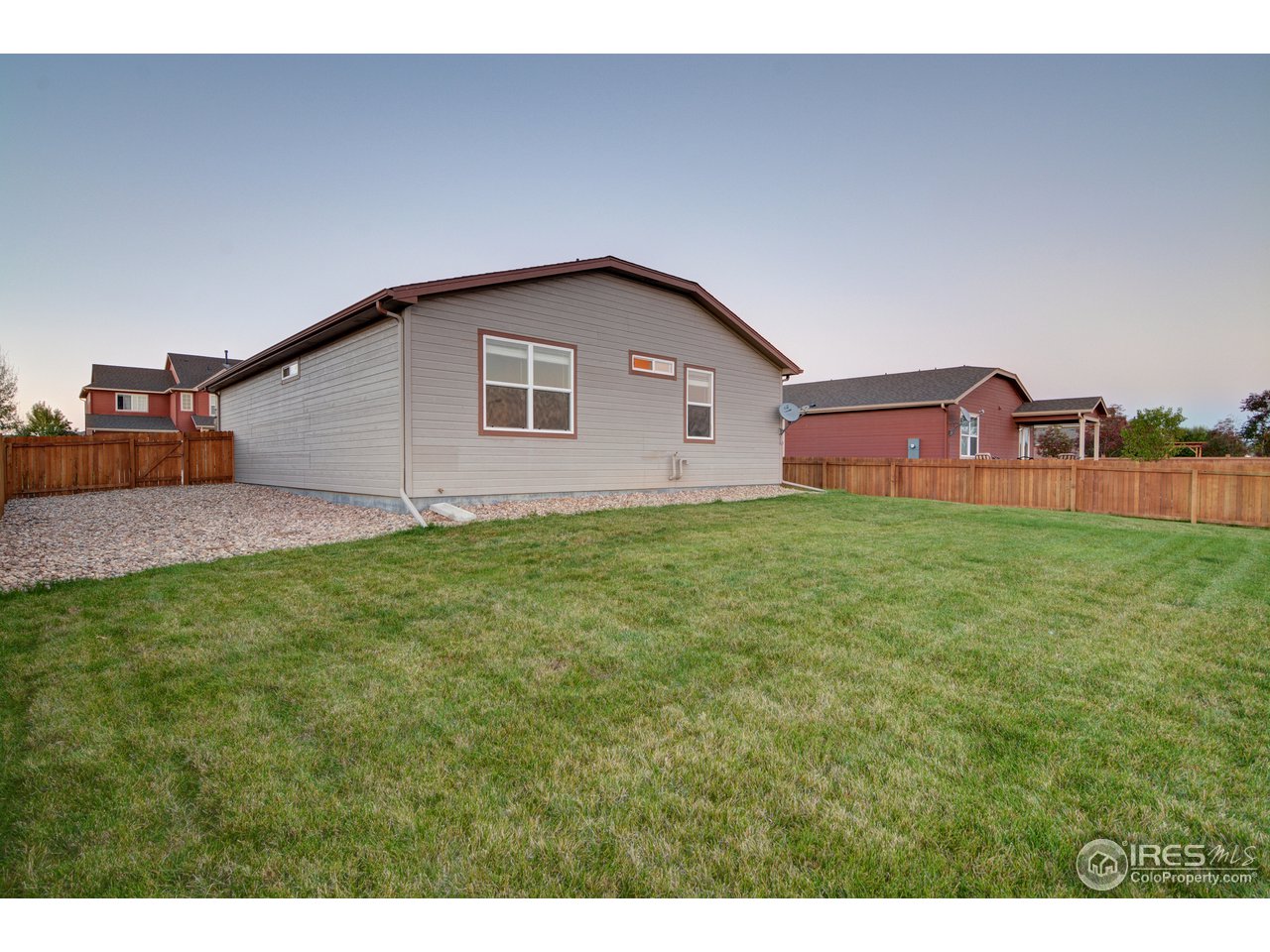 8050 Raspberry Drive Frederick, CO 80504 - Photo 8 of 17 a house view with a garden space