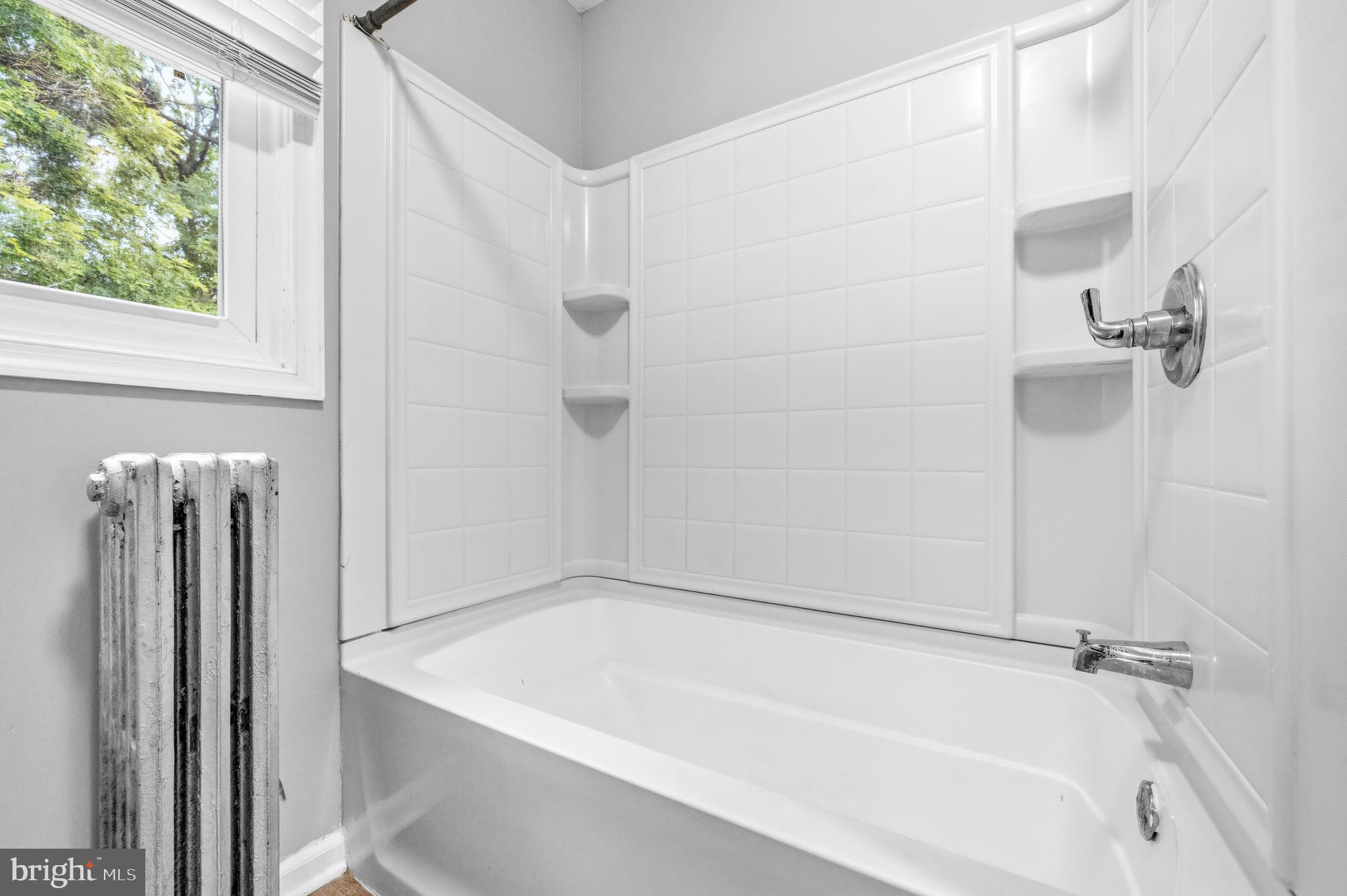12 Leeway Dundalk, MD 21222 - Photo 25 of 34 a bathroom with a tub and shower
