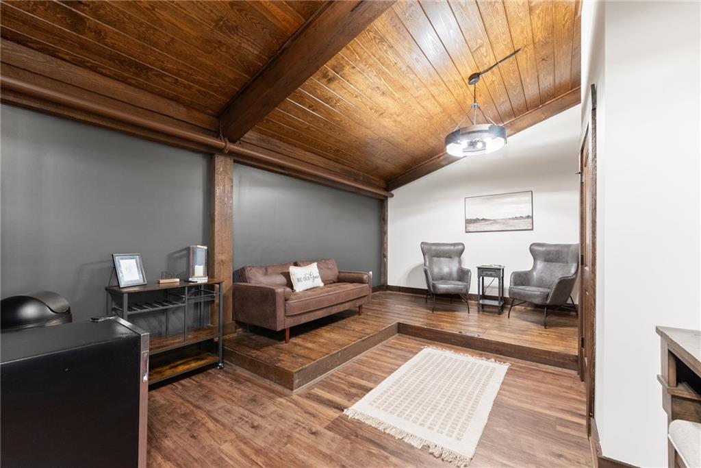 3263 Tanners Mill Road Gainesville, GA 30507 - Photo 120 of 197 a living room with furniture and a table