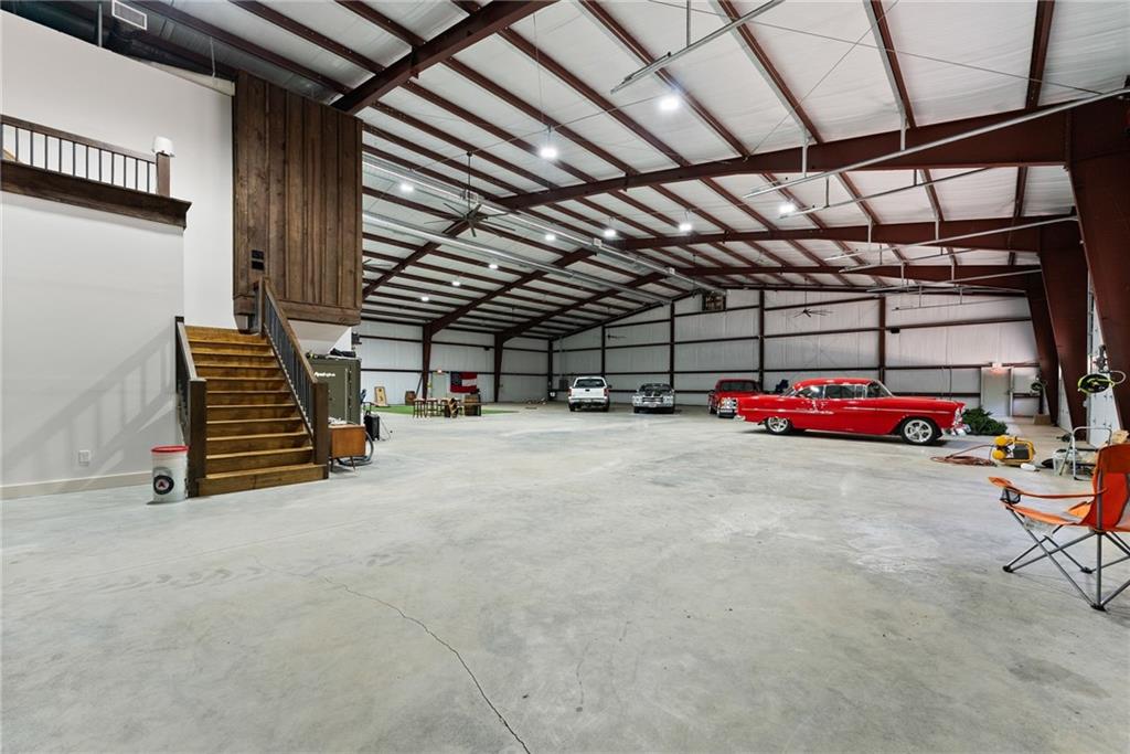 3263 Tanners Mill Road Gainesville, GA 30507 - Photo 151 of 197 a view of parking garage with cars parked
