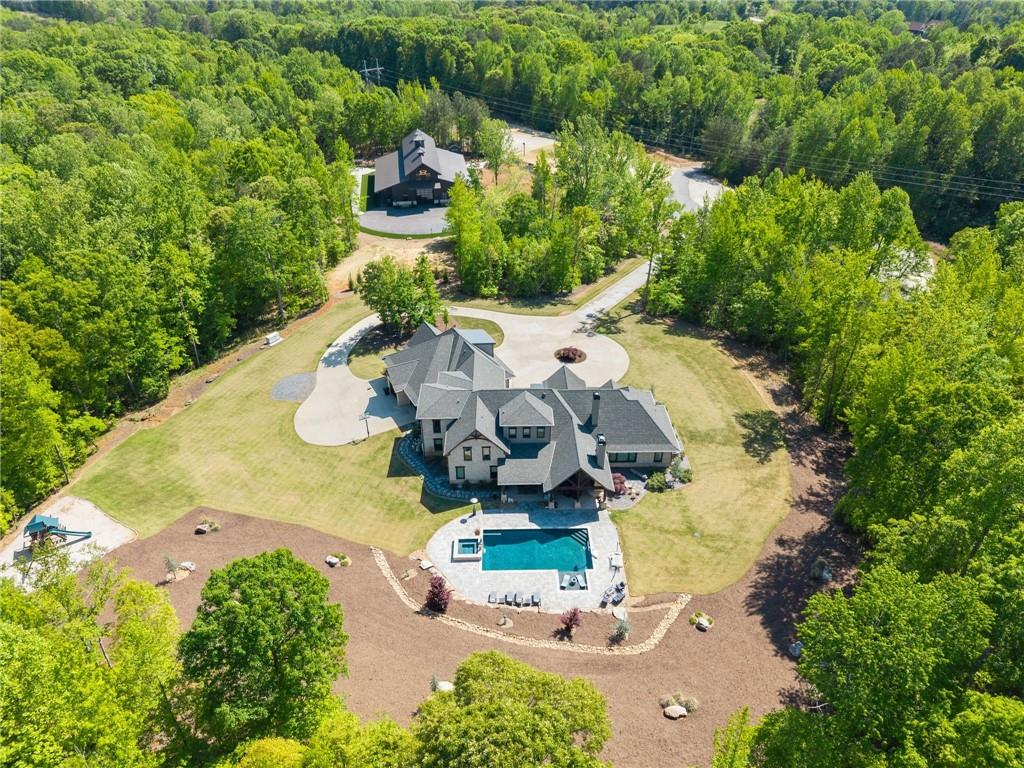 3263 Tanners Mill Road Gainesville, GA 30507 - Photo 181 of 197 an aerial view of a house with a yard