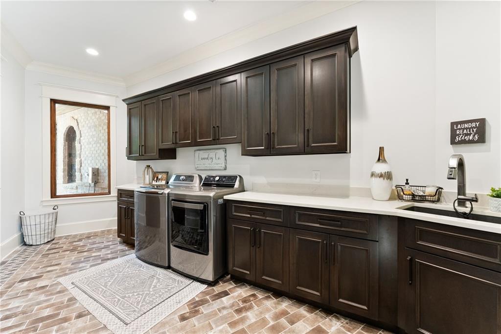 3263 Tanners Mill Road Gainesville, GA 30507 - Photo 29 of 197 a kitchen with stainless steel appliances granite countertop a stove a sink and a microwave