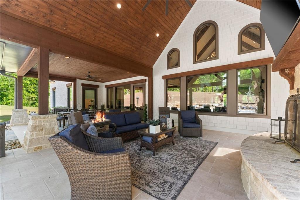 3263 Tanners Mill Road Gainesville, GA 30507 - Photo 68 of 197 a living room with furniture and large windows