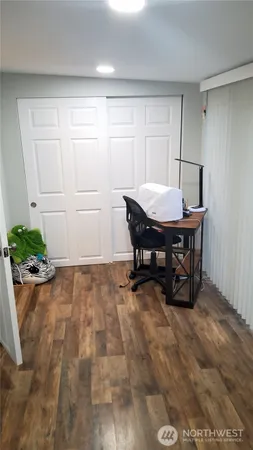 a room with furniture and window