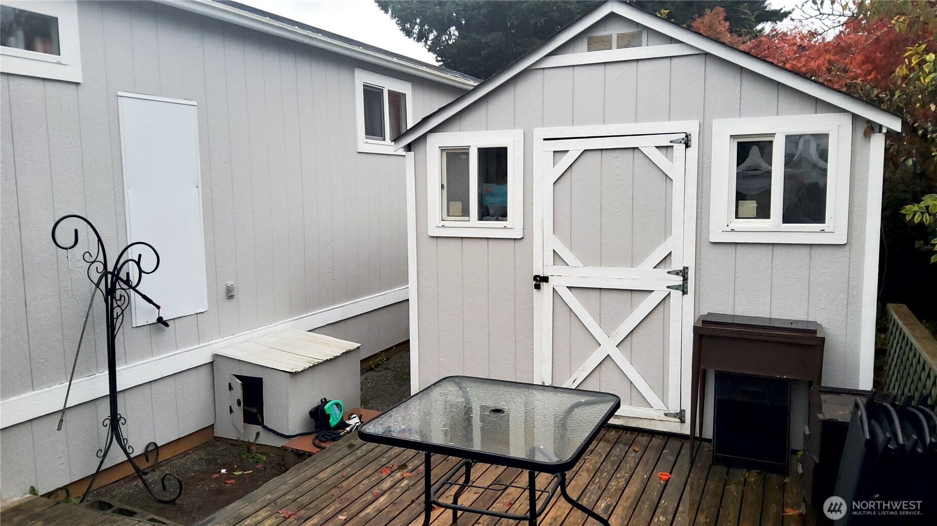 13320 Highway 99, Unit 34 Everett, WA 98204 - Photo 18 of 23 a view of house with roof deck and furniture