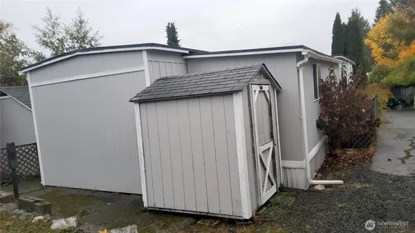 a view of a house with backyard space