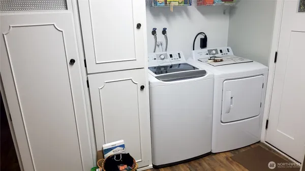 a utility room with dryer and washer