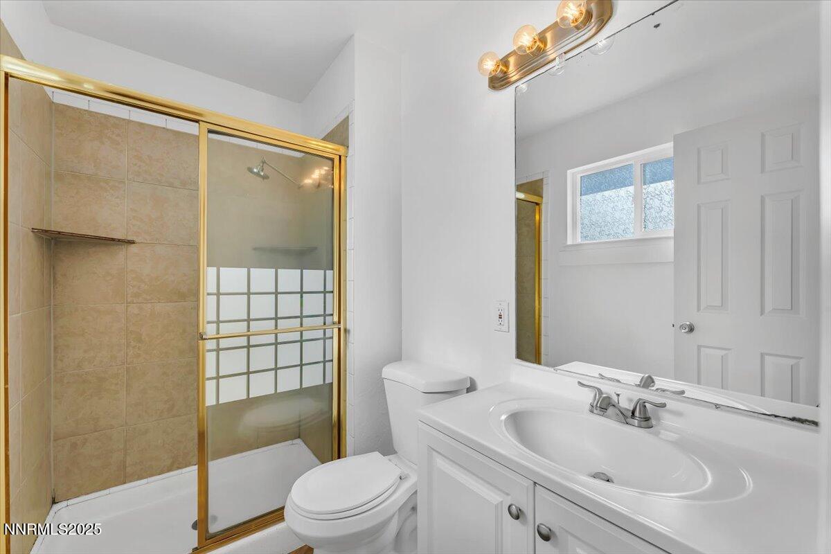 2801 Kings Row Reno, NV 89503 - Photo 16 of 32 a bathroom with a sink toilet and shower