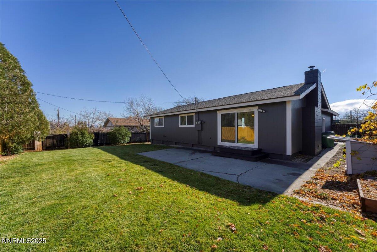 2801 Kings Row Reno, NV 89503 - Photo 22 of 32 a view of a house with backyard and porch