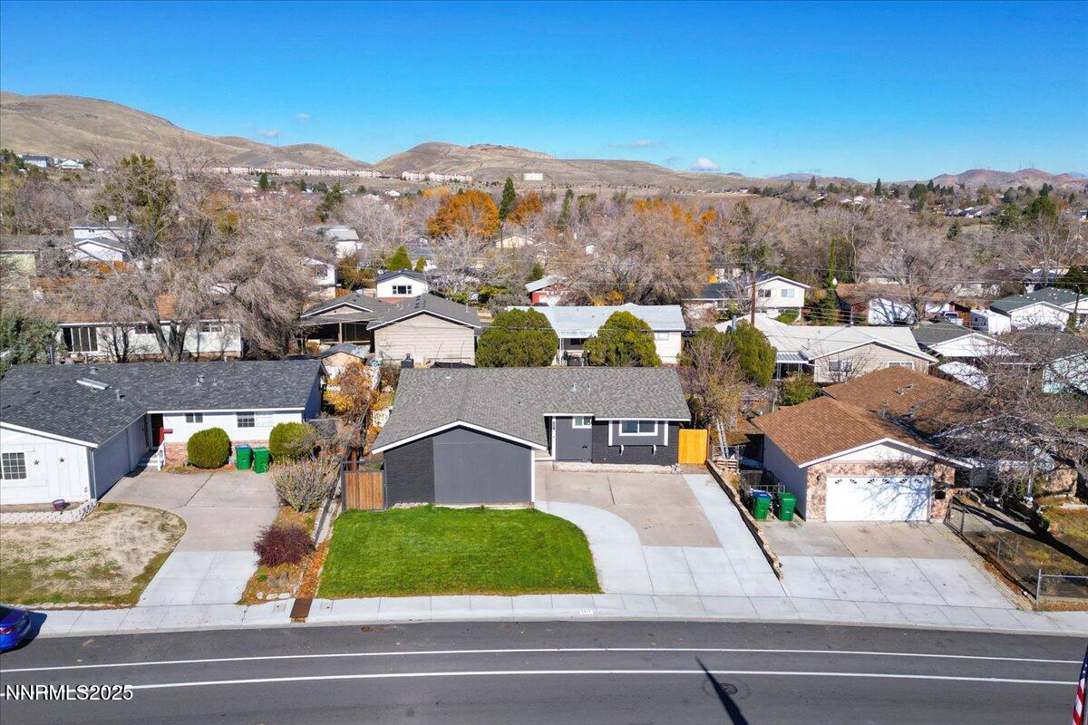 2801 Kings Row Reno, NV 89503 - Photo 25 of 32 an aerial view of residential houses with outdoor space and parking