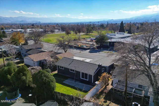an aerial view of a house with a garden view