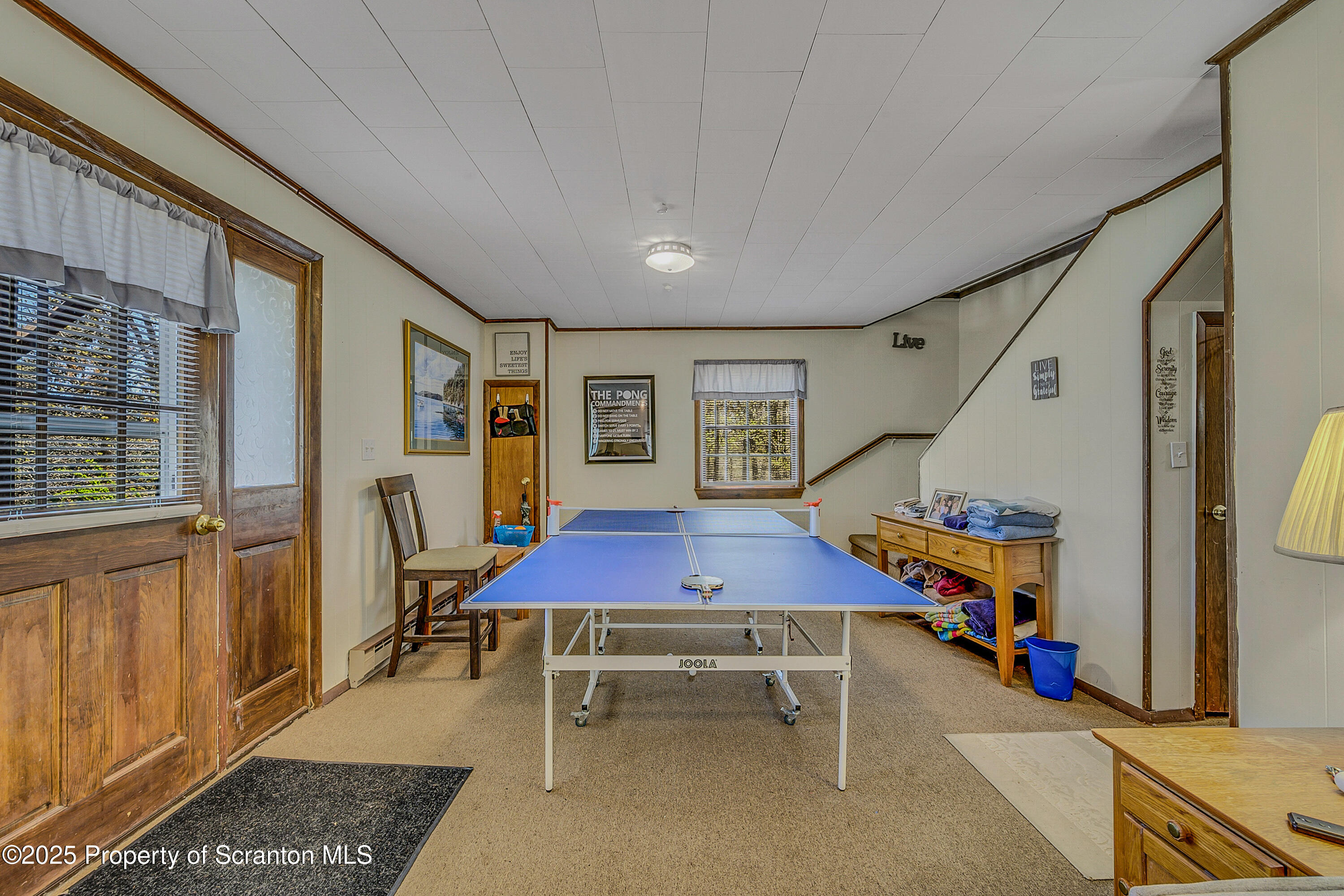 106 Lookout Drive Hawley, PA 18428 - Photo 16 of 43 a dining room with furniture and wooden floor
