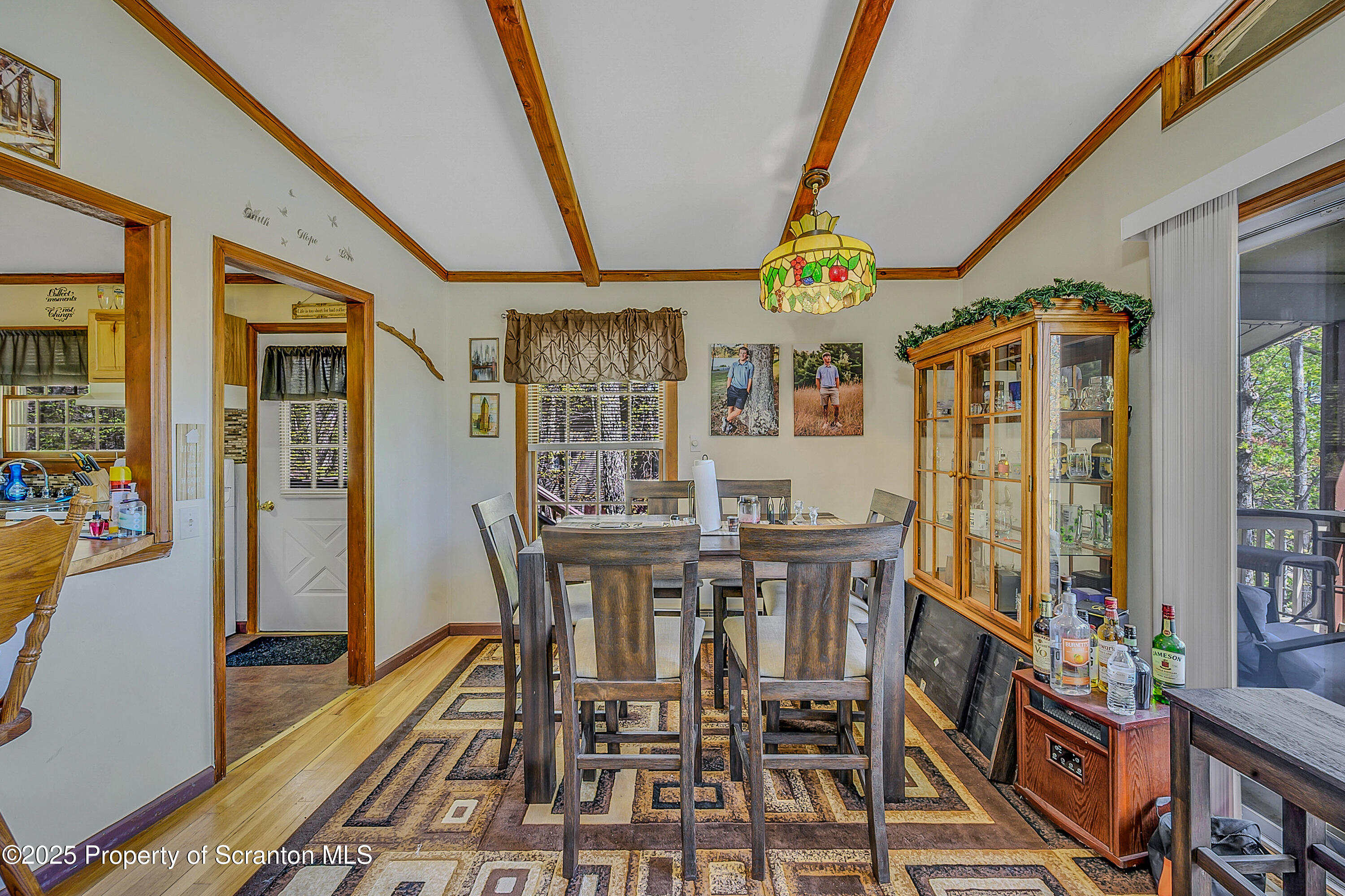 106 Lookout Drive Hawley, PA 18428 - Photo 29 of 43 a view of a dining room with furniture window and wooden floor