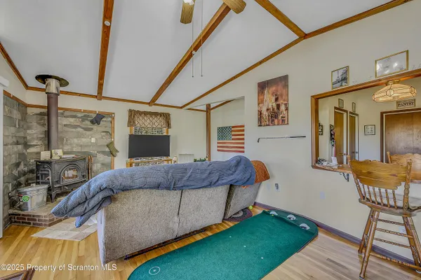 a living room with furniture and a rug