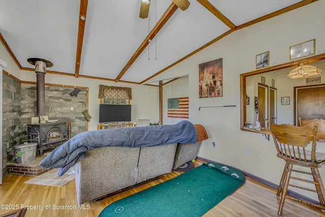 a living room with furniture and a rug